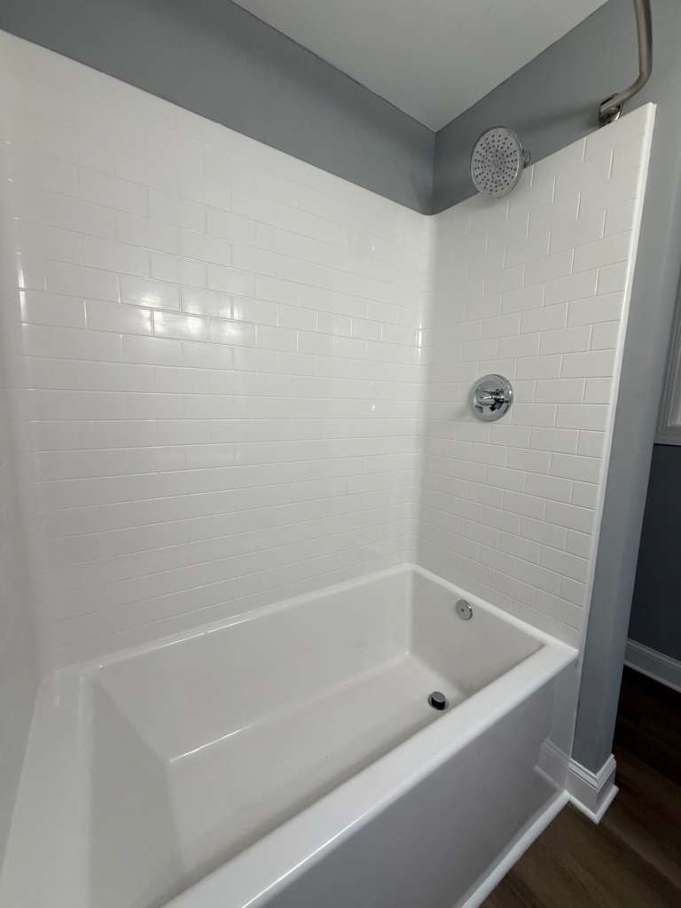 Finished bedroom with carpet and ceiling fan